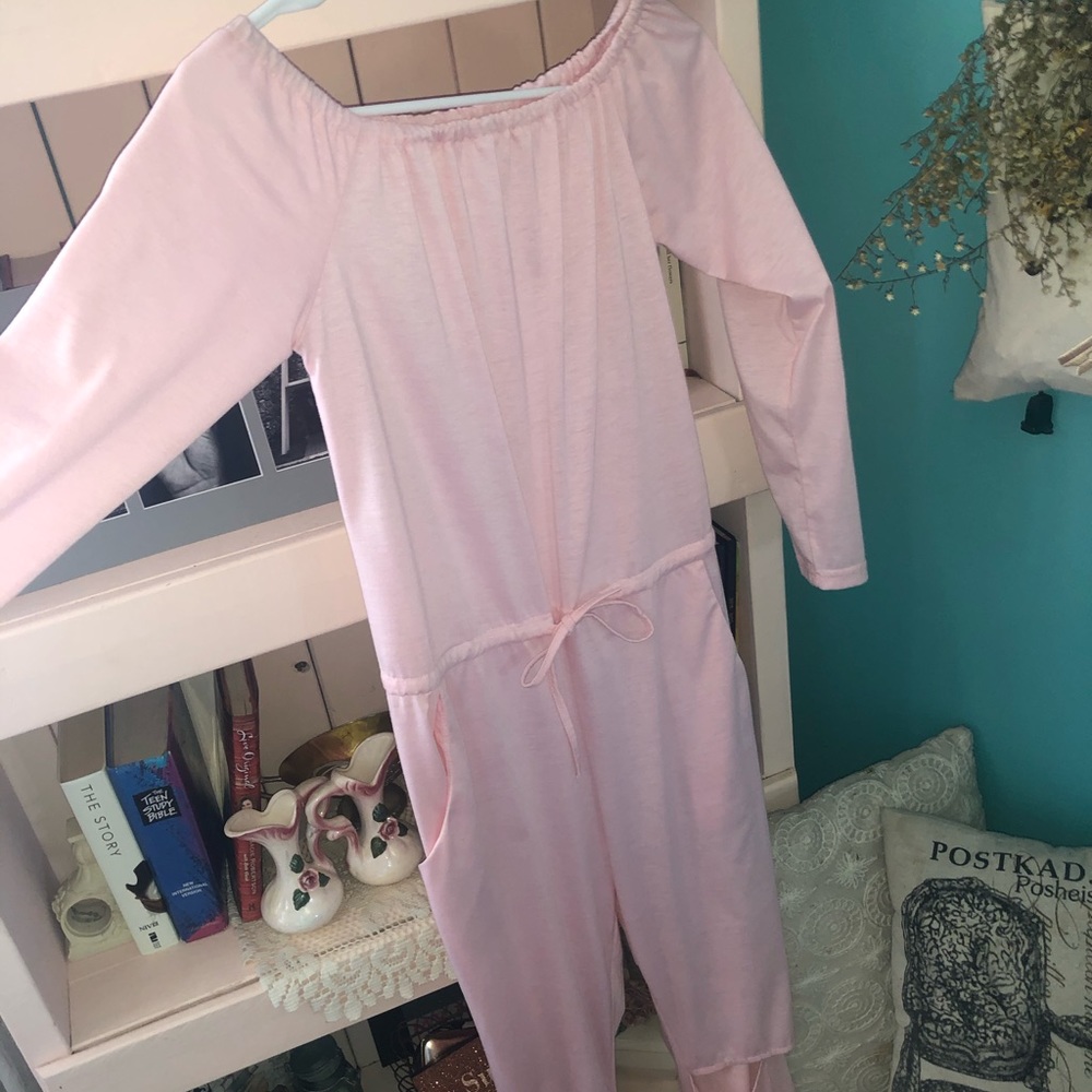 Pink Long sleeve romper.
